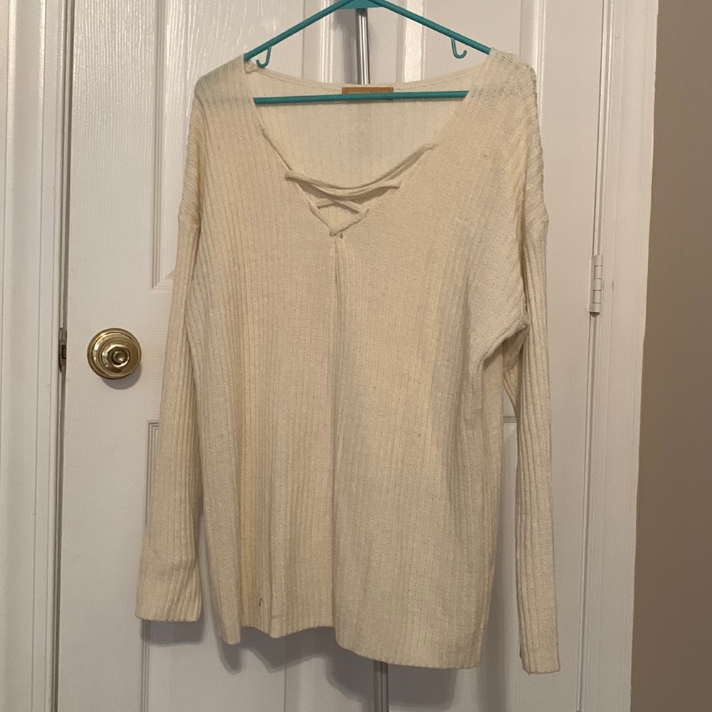 Emmer and Oat cream colored sweater. Size M/L.